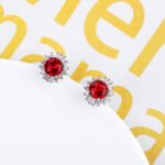 Wholesale Round Stud Earrings with a gold plated finish and clear cubic zirconia stones from JuneJewelry.com – unique fashion jewelry for bulk orders.