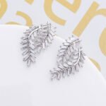 Wholesale baguette leaf earrings with sparkling cubic zirconia stones and a 925 silver needle from junejewelry.com – unique fashion jewelry for bulk orders.