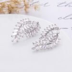 Wholesale baguette leaf earrings with sparkling cubic zirconia stones and a 925 silver needle from junejewelry.com – unique fashion jewelry for bulk orders.