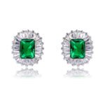 Wholesale emerald cut stud earrings with a starburst halo of CZ stones, a platinum-plated brass base, and 925 silver needle from junejewelry.com.
