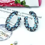 Wholesale colorful C-hoop earrings with multi-colored zircons on gold plated copper and 925 sterling silver pins from JuneJewelry.com – vibrant fashion jewelry for bulk orders.