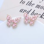Wholesale Butterfly Stud Earrings with gold plating and cubic zirconia stones from JuneJewelry.com – unique fashion jewelry for bulk orders.