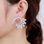 Wholesale Cubic Zirconia Statement Earrings with a unique spiral design from JuneJewelry.com – silver tone fashion jewelry for bulk orders.