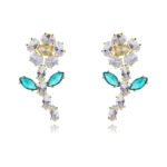 Wholesale Flower Dangle Earrings with a gold plated finish and green and clear cubic zirconia stones from JuneJewelry.com – unique fashion jewelry for bulk orders.