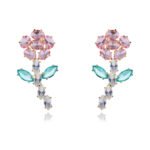 Wholesale Flower Dangle Earrings with a gold plated finish and green and clear cubic zirconia stones from JuneJewelry.com – unique fashion jewelry for bulk orders.