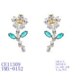 Wholesale Flower Dangle Earrings with a gold plated finish and green and clear cubic zirconia stones from JuneJewelry.com – unique fashion jewelry for bulk orders.