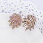 Wholesale gold flower stud earrings with pink and white CZ pavé stones and a 925 silver needle from junejewelry.com – unique fashion jewelry for bulk orders.