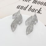 Wholesale Butterfly Stud Earrings with a silver plated finish and clear cubic zirconia stones from JuneJewelry.com – unique fashion jewelry for bulk orders.