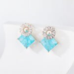 Wholesale geometric drop earrings with a square-cut CZ stone and baguette circle top from junejewelry.com – modern fashion jewelry for bulk orders.