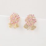 Wholesale Enamel Flower Stud Earrings with a gold plated finish and cubic zirconia stones from JuneJewelry.com – unique fashion jewelry for bulk orders.