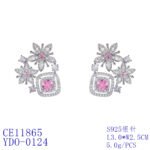 Wholesale pink flower earrings with a zircon flower cluster on rhodium plated copper and 925 sterling silver pins from JuneJewelry.com – elegant floral jewelry for bulk orders.