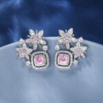 Wholesale pink flower earrings with a zircon flower cluster on rhodium plated copper and 925 sterling silver pins from JuneJewelry.com – elegant floral jewelry for bulk orders.
