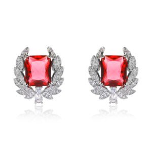 Wholesale zircon leaf earrings with a central red stone and a leaf motif with white cubic zirconia, platinum plated on a copper base with a 925 silver needle, from JuneJewelry.com.
