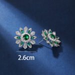 Wholesale Colorful Flower Stud Earrings with a gold plated finish and ruby red cubic zirconia stones from JuneJewelry.com – unique fashion jewelry for bulk orders.
