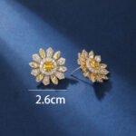Wholesale Colorful Flower Stud Earrings with a gold plated finish and ruby red cubic zirconia stones from JuneJewelry.com – unique fashion jewelry for bulk orders.