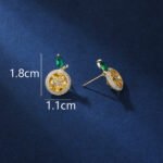 Wholesale lemon slice earrings with bright yellow and green zircon stones, a gold-plated copper base, and a 925 silver needle from JuneJewelry.com.