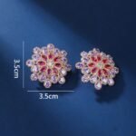 Wholesale Blue Stone Flower Earrings with a gold plated finish and cubic zirconia stones from JuneJewelry.com – unique fashion jewelry for bulk orders.