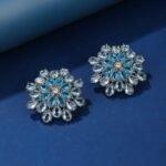 Wholesale Blue Stone Flower Earrings with a gold plated finish and cubic zirconia stones from JuneJewelry.com – unique fashion jewelry for bulk orders.
