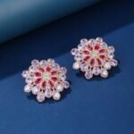 Wholesale Blue Stone Flower Earrings with a gold plated finish and cubic zirconia stones from JuneJewelry.com – unique fashion jewelry for bulk orders.