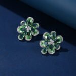 Wholesale Colorful Flower Stud Earrings with a gold plated finish and multi-colored cubic zirconia stones from JuneJewelry.com – unique fashion jewelry for bulk orders.