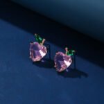 Wholesale Heart Stud Earrings with a gold plated finish and pink and green cubic zirconia stones from JuneJewelry.com – unique fashion jewelry for bulk orders.