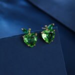 Wholesale Heart Stud Earrings with a gold plated finish and pink and green cubic zirconia stones from JuneJewelry.com – unique fashion jewelry for bulk orders.