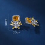 Wholesale pink gemstone earrings with a zircon flower on rhodium plated copper and 925 sterling silver pins from JuneJewelry.com – unique fashion jewelry for bulk orders.