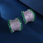 Wholesale Colorful Statement Earrings with a gold plated finish and orange and blue cubic zirconia stones from JuneJewelry.com – unique fashion jewelry for bulk orders.