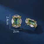 Wholesale pink gemstone earrings with a gold plated setting and zircon cluster on 925 sterling silver pins from JuneJewelry.com – unique fashion jewelry for bulk orders.