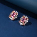 Wholesale pink gemstone earrings with a gold plated setting and zircon cluster on 925 sterling silver pins from JuneJewelry.com – unique fashion jewelry for bulk orders.