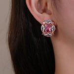 Wholesale pink gemstone earrings with a gold plated setting and zircon cluster on 925 sterling silver pins from JuneJewelry.com – unique fashion jewelry for bulk orders.
