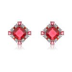 Wholesale ruby red gemstone stud earrings with a zircon cluster on rhodium plated copper and 925 sterling silver pins from JuneJewelry.com – elegant fashion jewelry for bulk orders.