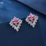 Wholesale Cubic Zirconia Stud Earrings with a central pear-shaped stone and silver plating from JuneJewelry.com – elegant and unique jewelry for bulk orders.