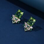 Wholesale pink gemstone earrings with a gold plated setting and zircon cluster on 925 sterling silver pins from JuneJewelry.com – unique fashion jewelry for bulk orders.