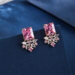 Wholesale pink gemstone earrings with a gold plated setting and zircon cluster on 925 sterling silver pins from JuneJewelry.com – unique fashion jewelry for bulk orders.