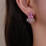 Wholesale pink gemstone earrings with a gold plated setting and zircon cluster on 925 sterling silver pins from JuneJewelry.com – unique fashion jewelry for bulk orders.