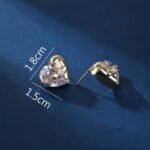 Wholesale heart stud earrings with a clear zircon stone on gold plated copper and 925 sterling silver pins from JuneJewelry.com – romantic fashion jewelry for bulk orders.
