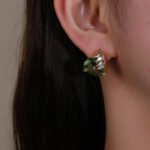 Wholesale heart stud earrings with a clear zircon stone on gold plated copper and 925 sterling silver pins from JuneJewelry.com – romantic fashion jewelry for bulk orders.