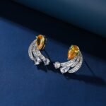 Wholesale Butterfly Stud Earrings with a gold plated finish and clear cubic zirconia stones from JuneJewelry.com – unique fashion jewelry for bulk orders.