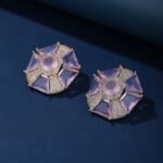 Wholesale pink gemstone stud earrings with a geometric flower design on gold plated copper and 925 sterling silver pins from JuneJewelry.com – unique fashion jewelry for bulk orders.