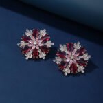 Wholesale Pink Flower Stud Earrings with a gold plated finish and pink and clear cubic zirconia stones from JuneJewelry.com – unique fashion jewelry for bulk orders.