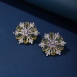 Wholesale Pink Flower Stud Earrings with a gold plated finish and pink and clear cubic zirconia stones from JuneJewelry.com – unique fashion jewelry for bulk orders.