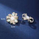 Wholesale Enamel Flower Stud Earrings with a gold plated finish and cubic zirconia stones from JuneJewelry.com – unique fashion jewelry for bulk orders.