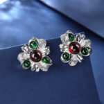 Wholesale Enamel Flower Stud Earrings with a gold plated finish and cubic zirconia stones from JuneJewelry.com – unique fashion jewelry for bulk orders.