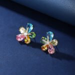 Wholesale Colorful Open Stud Earrings with a gold plated finish and multi-colored cubic zirconia stones from JuneJewelry.com – unique fashion jewelry for bulk orders.