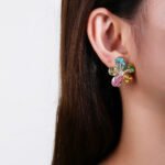 Wholesale Colorful Open Stud Earrings with a gold plated finish and multi-colored cubic zirconia stones from JuneJewelry.com – unique fashion jewelry for bulk orders.