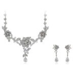 Wholesale floral zircon jewelry set, platinum plated on copper, featuring an intricate flower and leaf necklace with matching earrings from JuneJewelry.com – elegant bridal and special occasion jewelry.