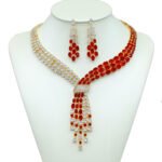 Wholesale tassel zircon necklace set with knot design and matching earrings, platinum plated on copper, from JuneJewelry.com – glamorous and unique fashion jewelry for bulk buyers.