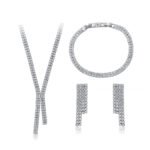 Wholesale cubic zirconia jewelry set. Platinum plated brass lariat necklace, tennis bracelet, and drop earrings for formal events.