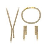 Wholesale cubic zirconia jewelry set. Platinum plated brass lariat necklace, tennis bracelet, and drop earrings for formal events.